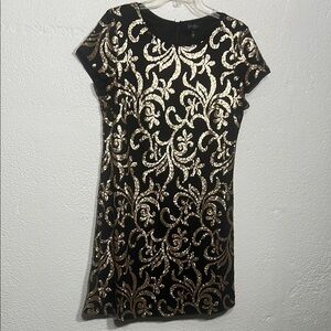 Jessica Simpson - Elegant Black and Gold sequence Dress size 10

Worn once